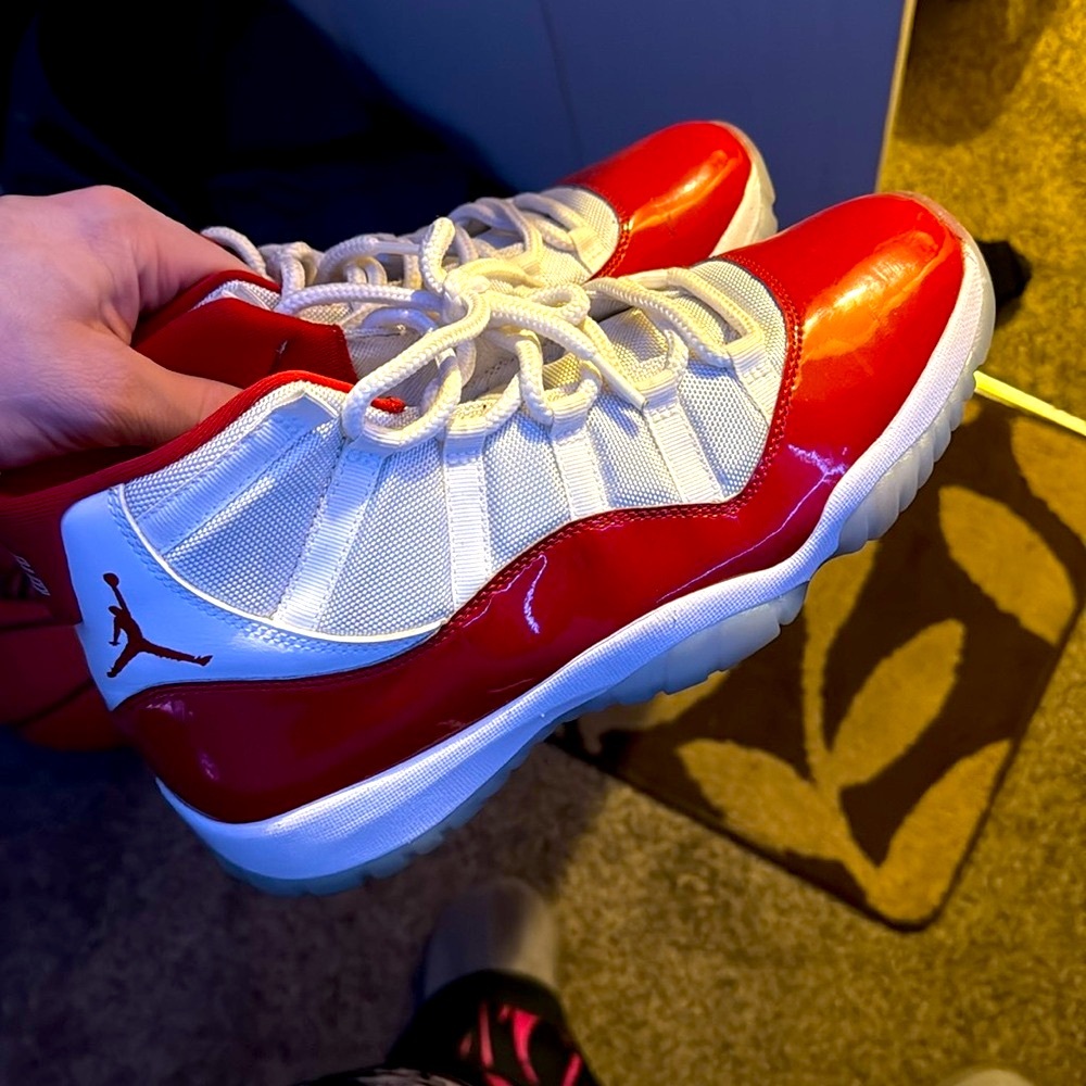 Red and white Jordan cherry 11s size 11